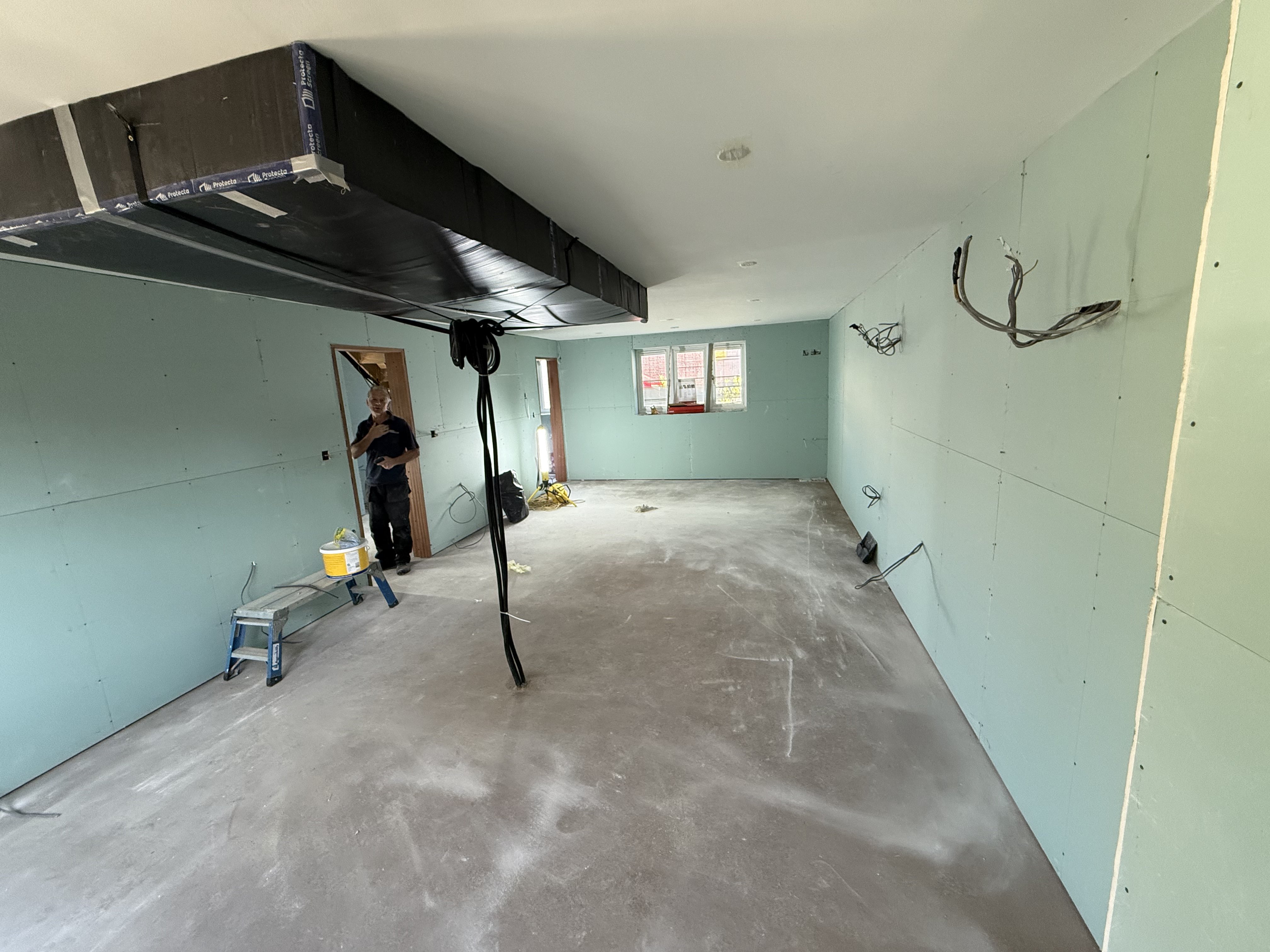 Kitchen — moisture-resistant plasterboard fitted throughout, walls battened out to receive the boards